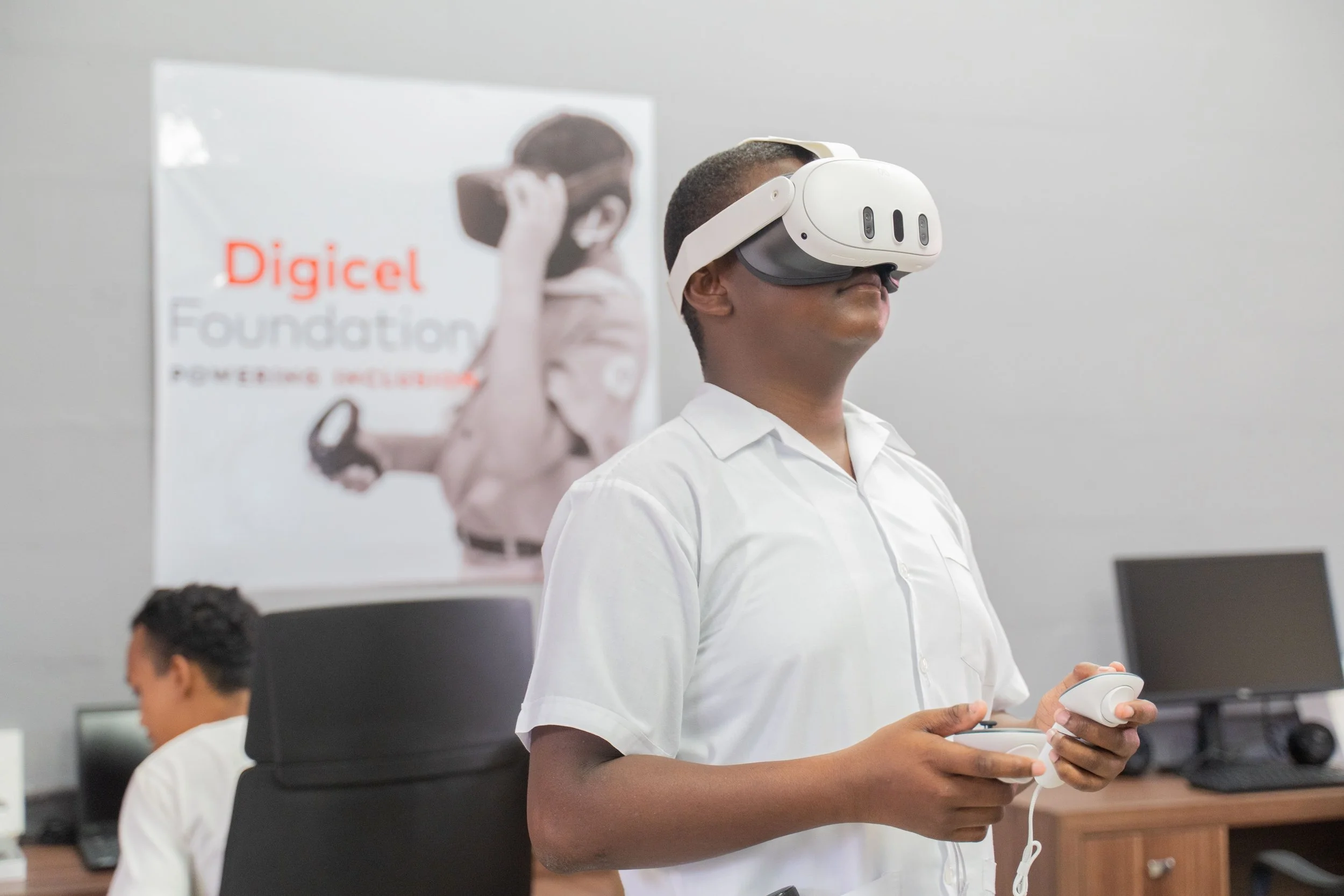  Learning Reimagined! A student explores learning with virtual reality technology in the Digicel Foundation Innovation Lab at the School for the Blind, Arouca.  