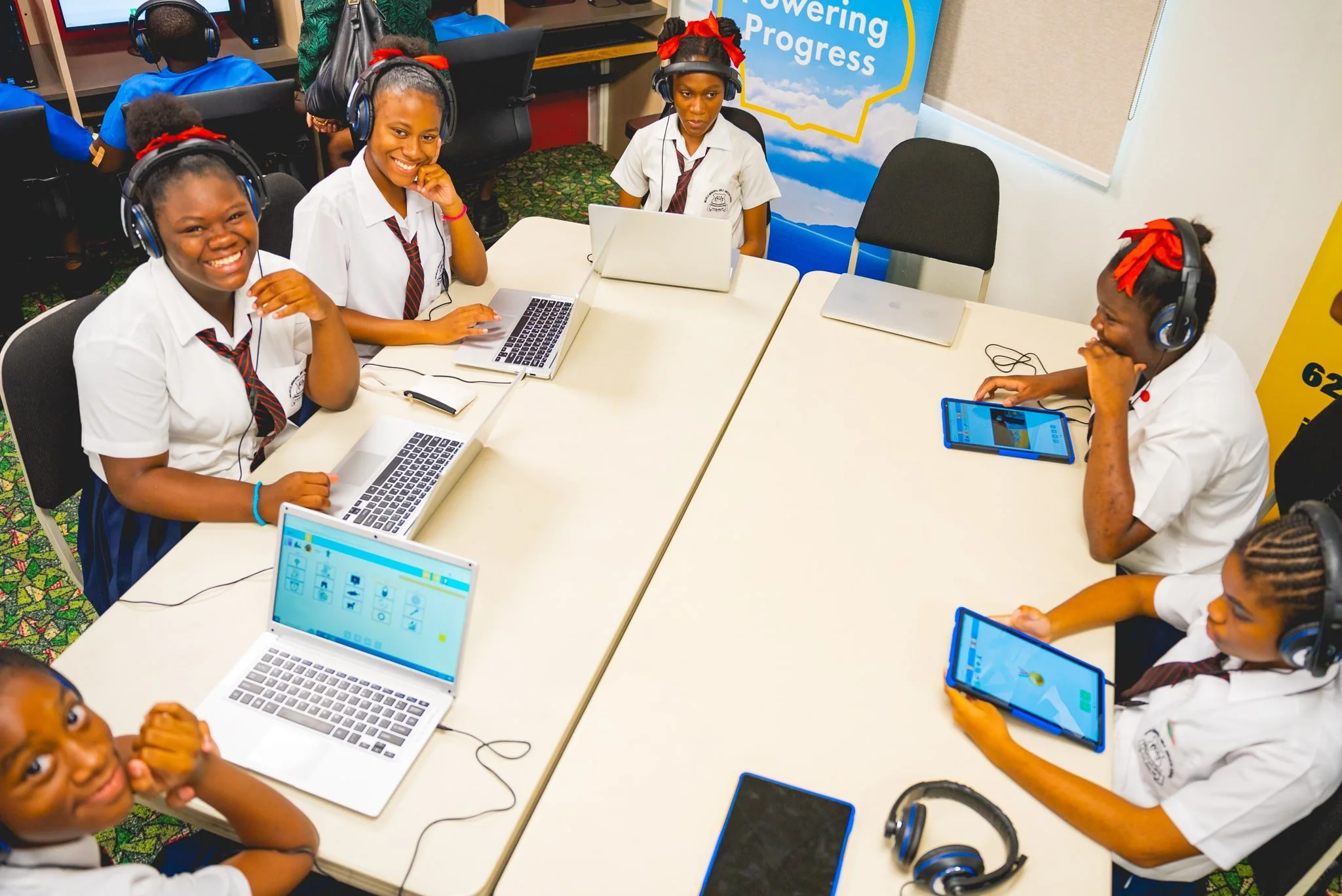  Students from Melville Memorial Girls’ Anglican School flash bright smiles as they explore the ALTA Online web-based literacy programme in the newly outfitted student hub at ALTA’s head office in Belmont, courtesy EPIC Grant funding from Digicel Foundation and Shell T&T. 