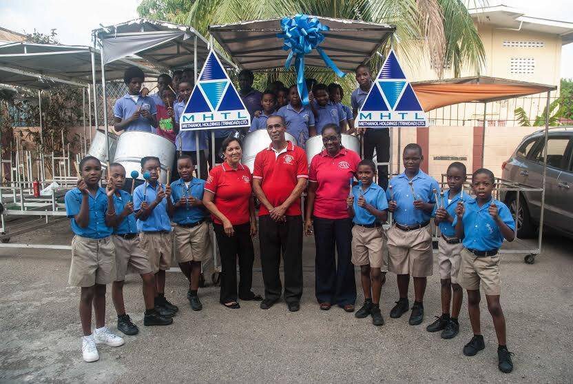  Members of the St. Margaret’s Boys’ Steel Orchestra pause for a memorable pose after receiving a US$100,000 cheque from MHTL for their performance at Carnegie Hall, New York City 