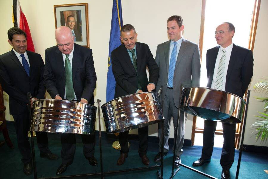 His Excellency President Anthony Carmona (centre) accompanies Joseph Cassidy, Director, Methanol Holdings (Trinidad) Limited (2nd from left) as he tries his hand at playing the pan. Looking on are (from left) Dennis Patrick, CEO Methanol Holdings (Trinidad) Limited, David Cassidy and Erwin Keutner, Directors of Methanol Holdings (Trinidad) Limited