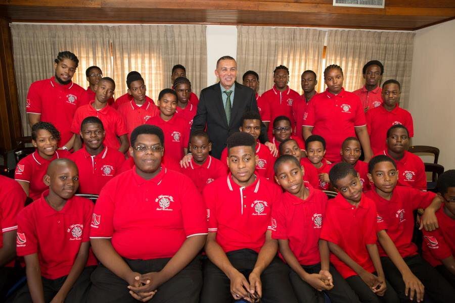 His Excellency President Anthony Carmona is surrounded by members of the St. Margaret’s Boys’ Steel Orchestra during their courtesy call at the Office of the President on Thursday, May 28 2015
