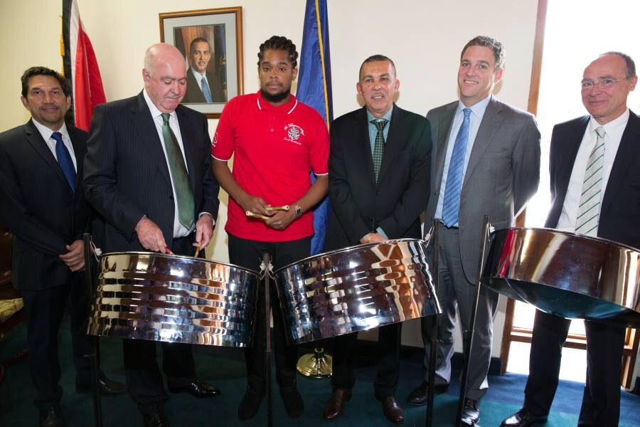 His Excellency President Anthony Carmona (3rd from right) and Akeem Henry, Captain of the St. Margaret’s Boys’ Steel Orchestra (3rd from left) share a moment along with (from left) Dennis Patrick, CEO, Methanol Holdings (Trinidad) Limited, Joseph Cassidy, David Cassidy and Erwin Keutner, Directors of Methanol Holdings (Trinidad) Limited