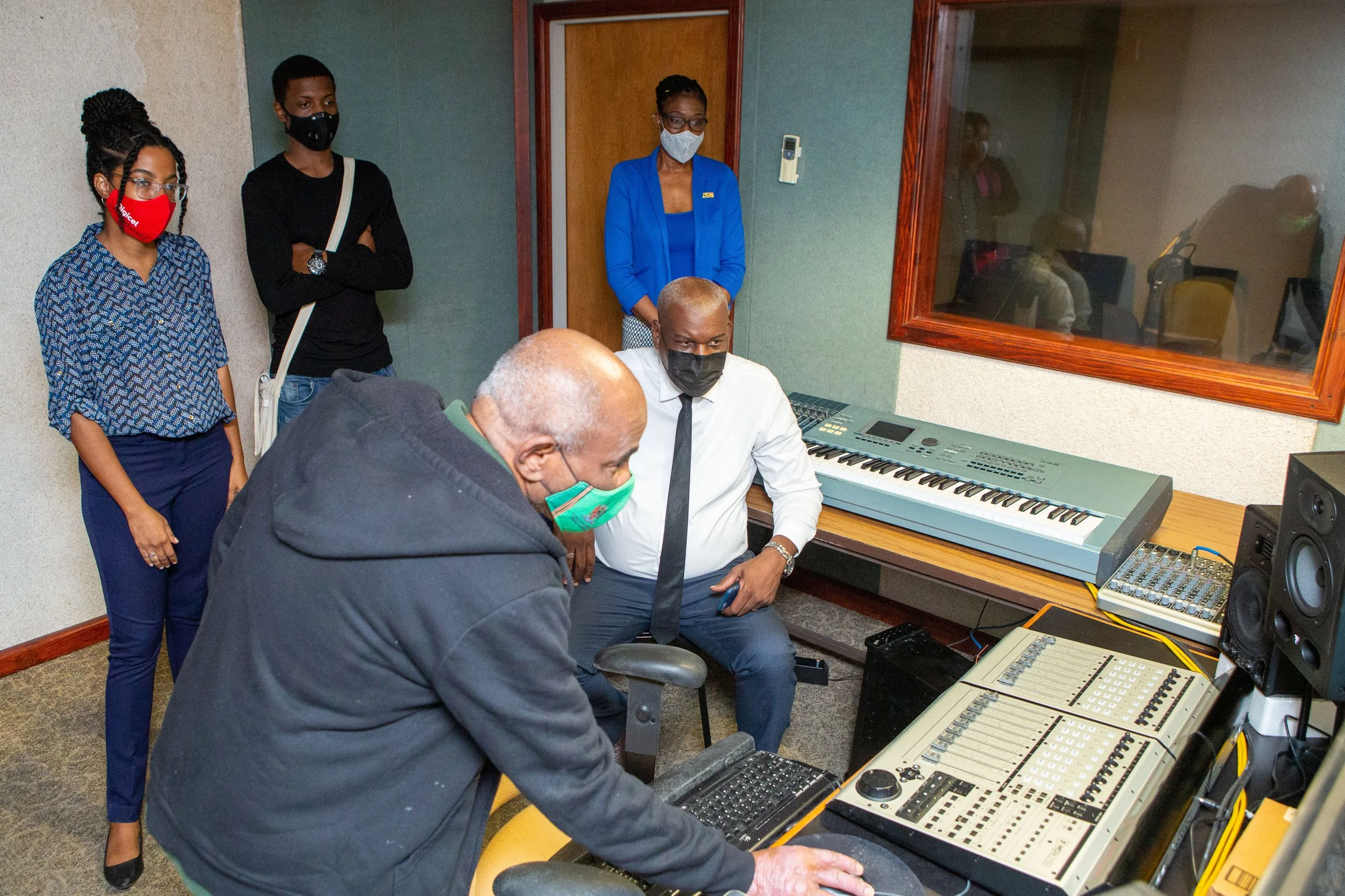 (L-R ) SVH Audio Publishing Ltd, Project Engineer- Robin Fraser cues up the audio recording for the team to listen to.