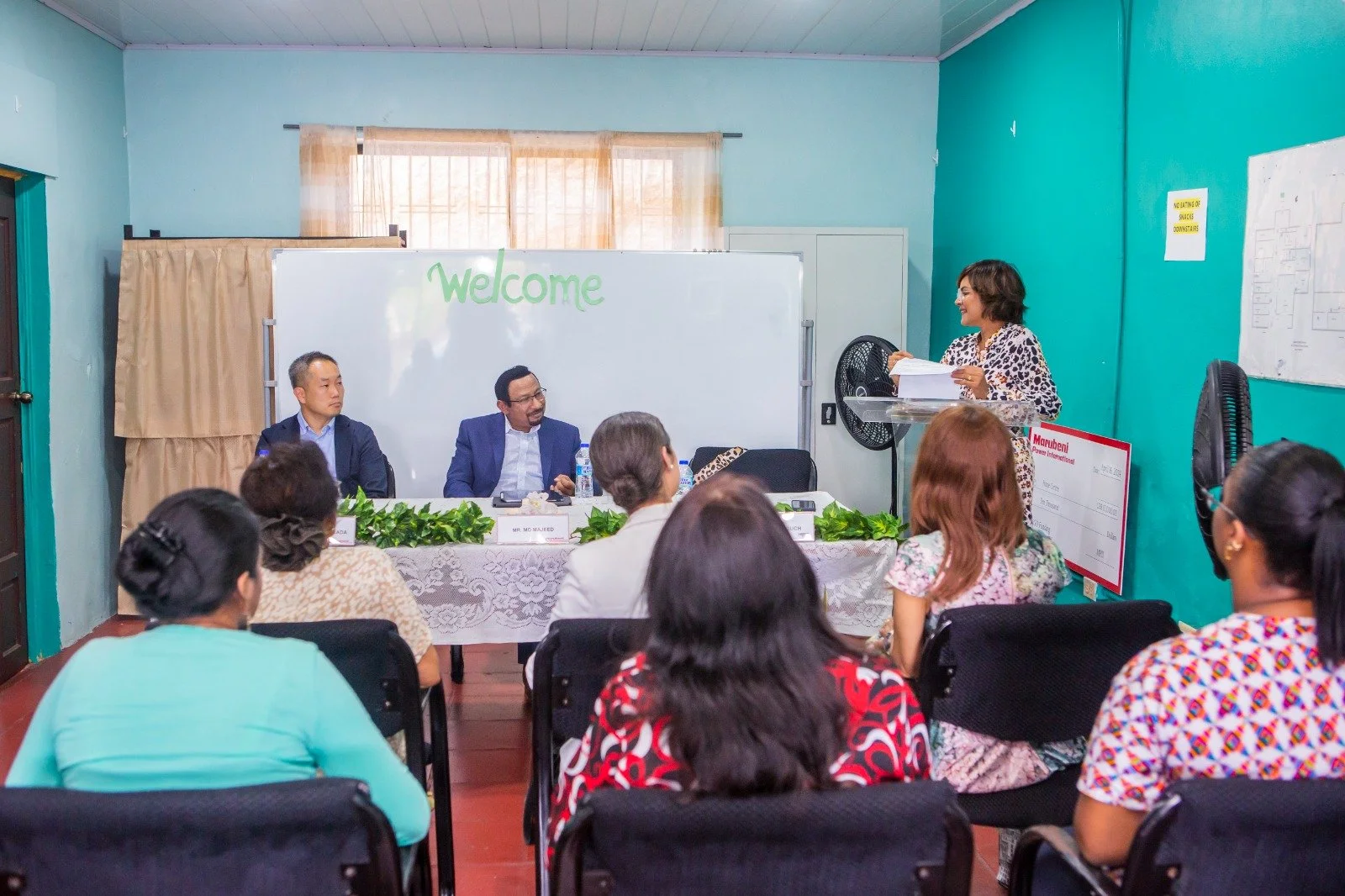 Dr Indira Couch, Hope Centre’s Chairperson, delivers the vote of thanks to Mr. Mo Majeed, COO, Managing Director Caribbean Operation, and Mr. Keisuke Harada, Senior Manager, of Marubeni Power International Inc. during the donation handover ceremony on April 16.