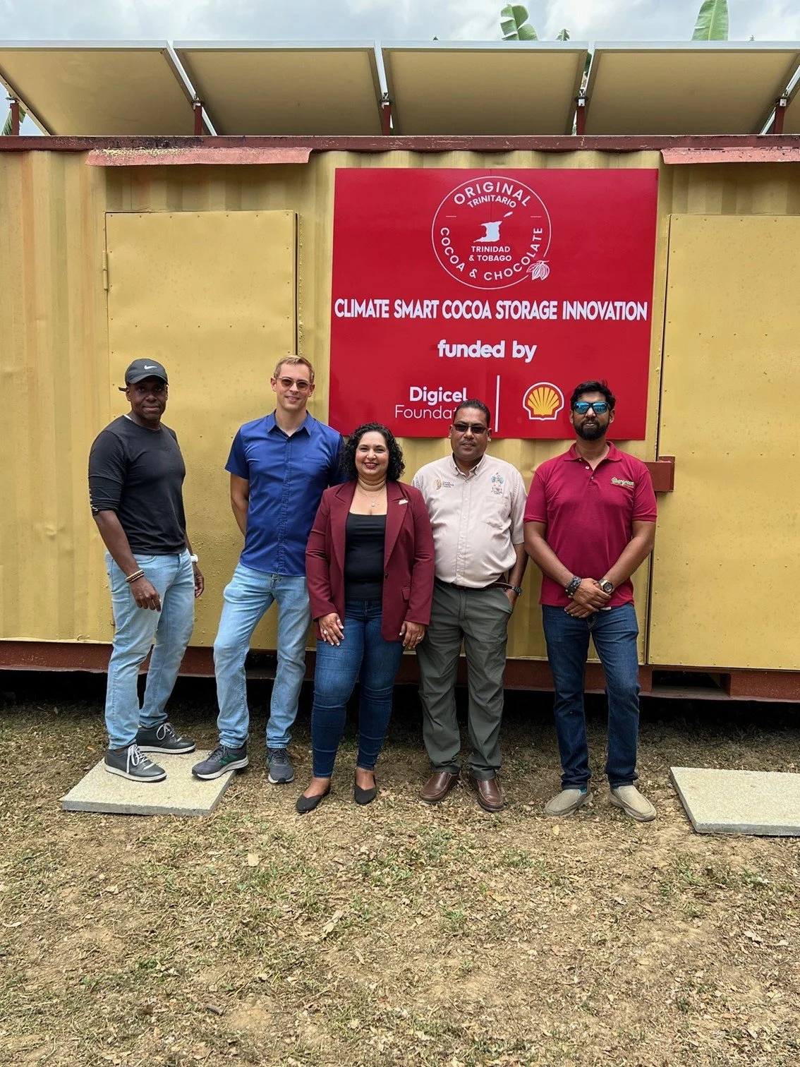  (L-R) Adrian Thomas - ReNewTT, Tobias Frenking - OTC Cluster Lead, Trijata Maraj - Digicel Foundation Director, Dr. Darin Sukha, - UWI Cocoa research Centre and Shawn Sajad -OTC, pose together during the unveiling of the new Climate Smart Cocoa Storage facility on March 27th 2024. 