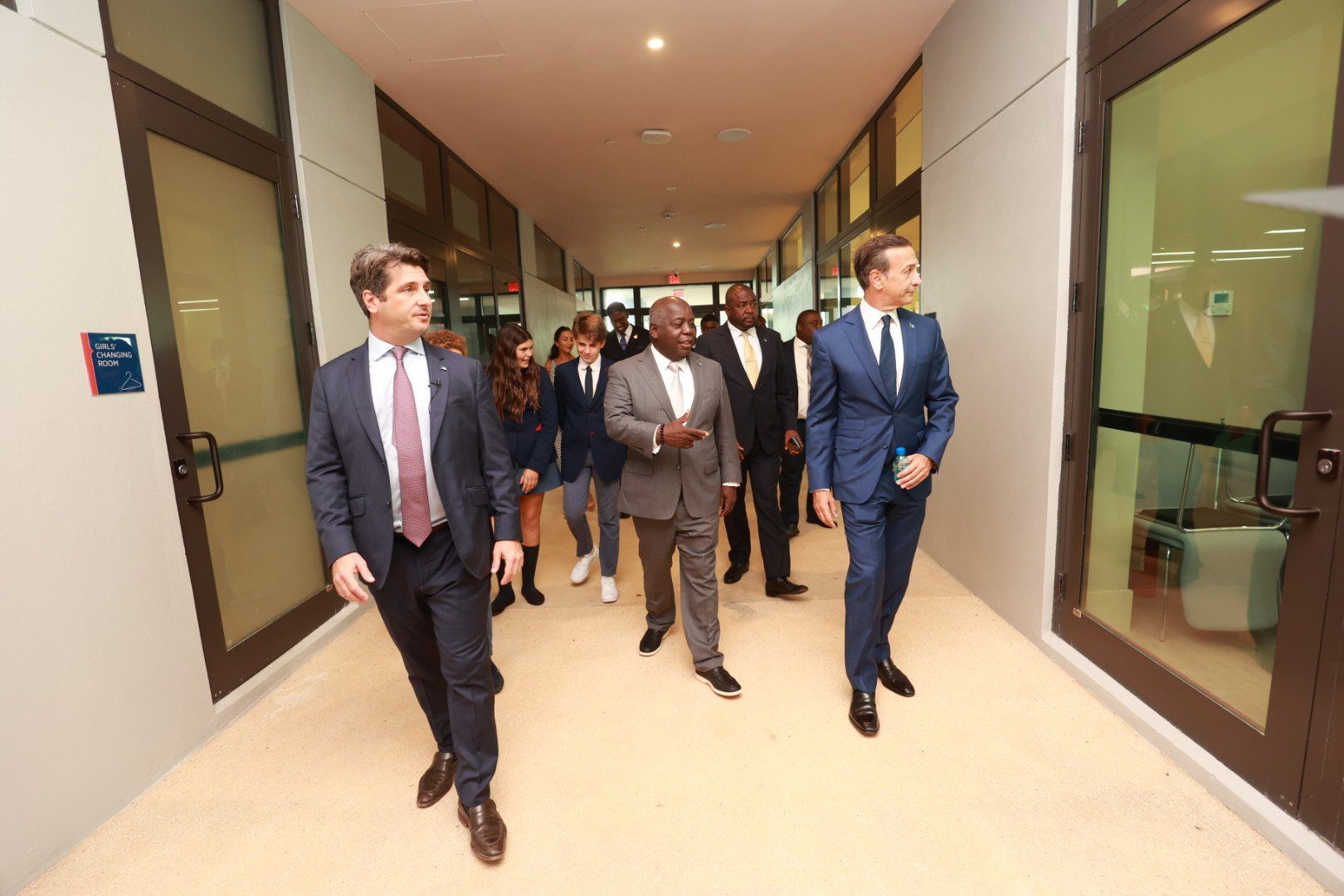 Prime Minister Davis (centre) tours King’s College School, The Bahamas, with Inspired Education’s Founder, Chairman and CEO Nadim Nsouli (right) and Principal Matteo Rossetti (left) at the official opening of the campus in September 2023.