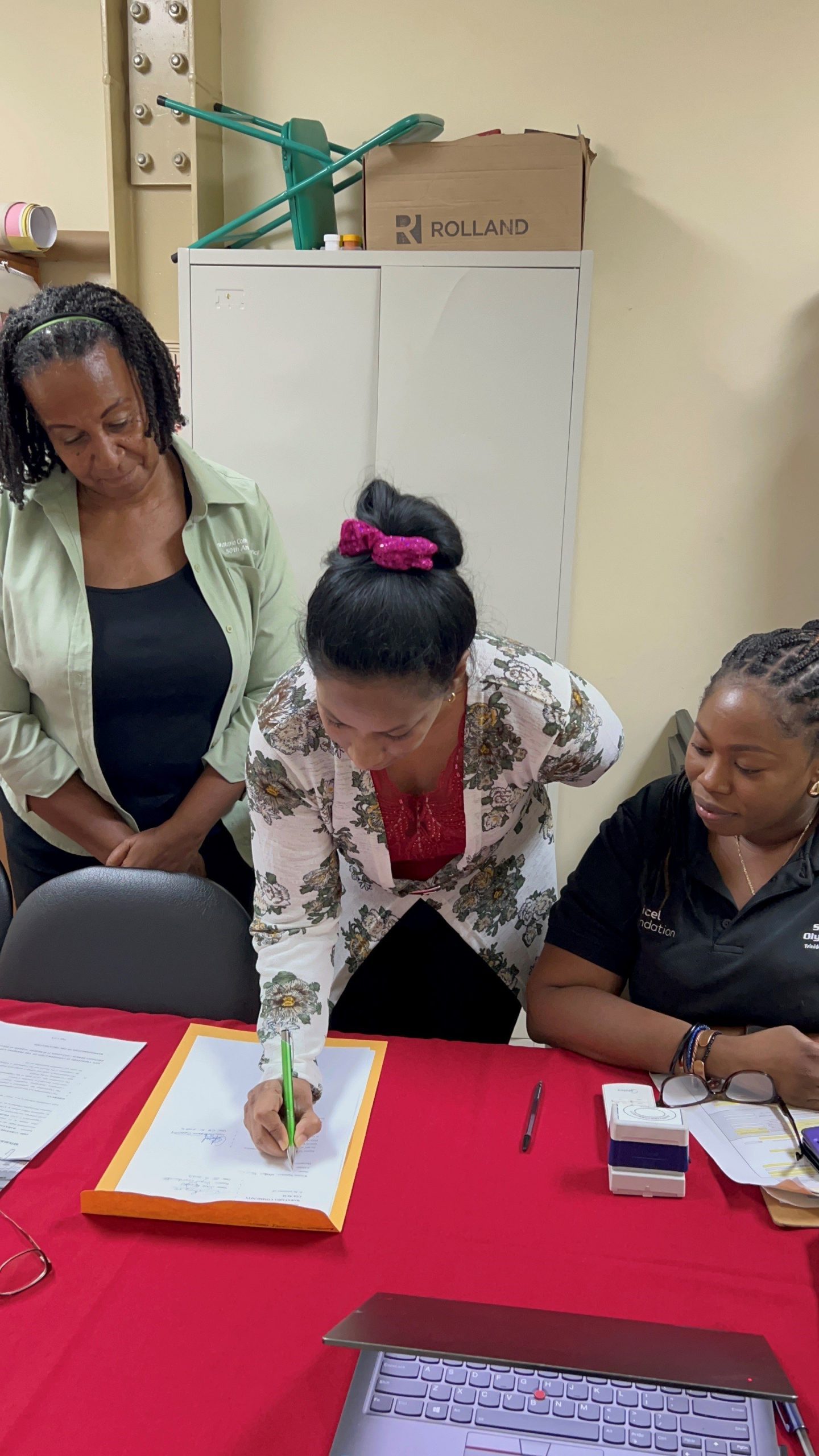 Members of the Barataria Community Council sign the Digicel Foundation and Shell’s 2023 EPIC Programme contract.