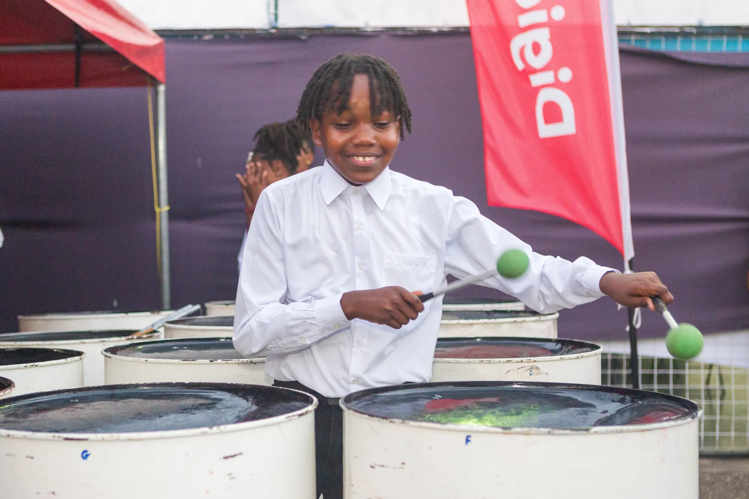  A moment of mesmerizing harmony as this young prodigy brings the magic of steelpan to life at Pandemonium Panyard in February 2024. 