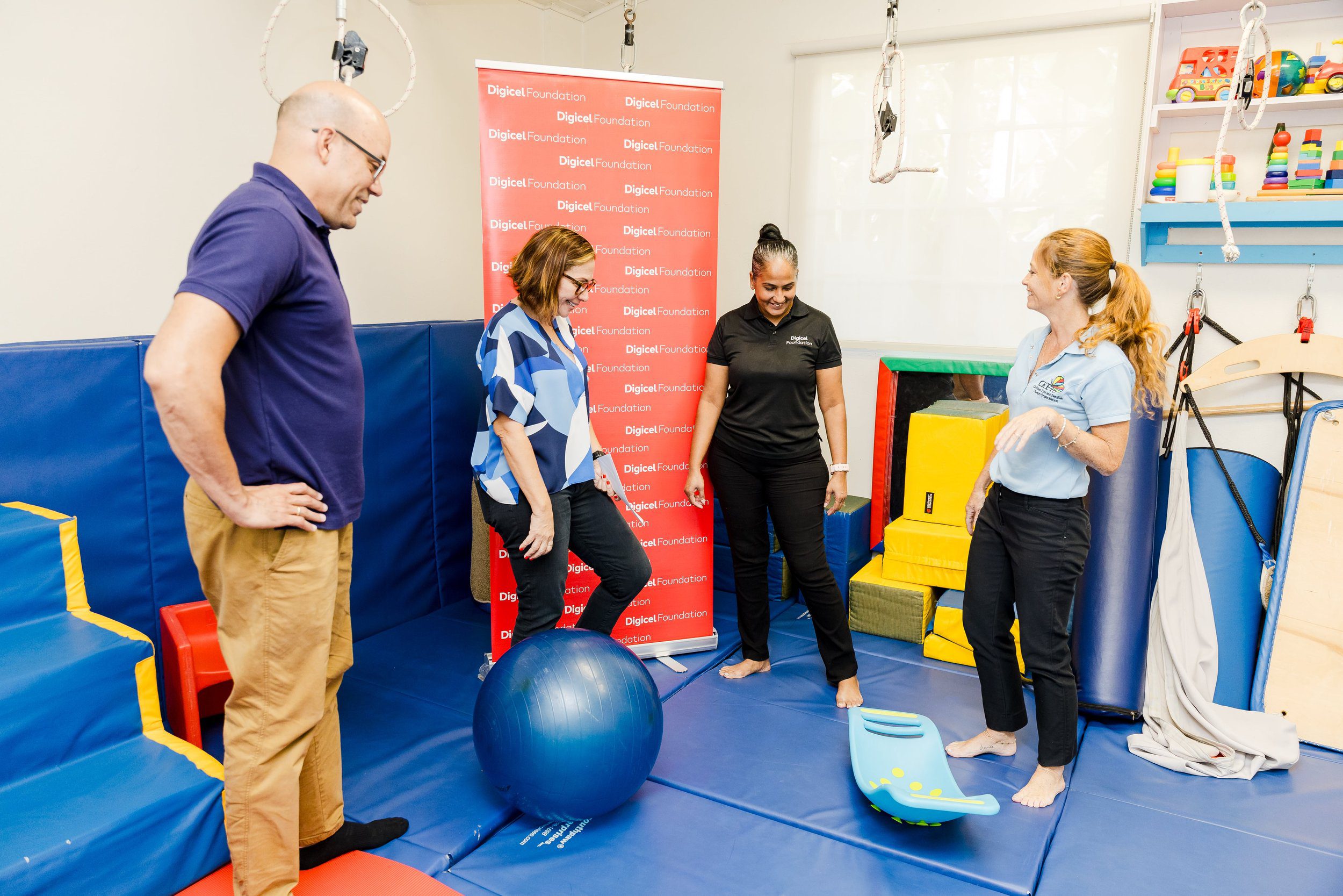 From left to right: Samuel Everdium – Cuevas Medek Exercises (CME) Specialist; Sofia Figueroa-Leon – Vice Chair, CKFTO; Diana Mathura-Hobson – Project Officer, Digicel Foundation; and Krista Hamel-Smith – General Manager, CKFTO, at CKFTO’s Port of Spain clinic.