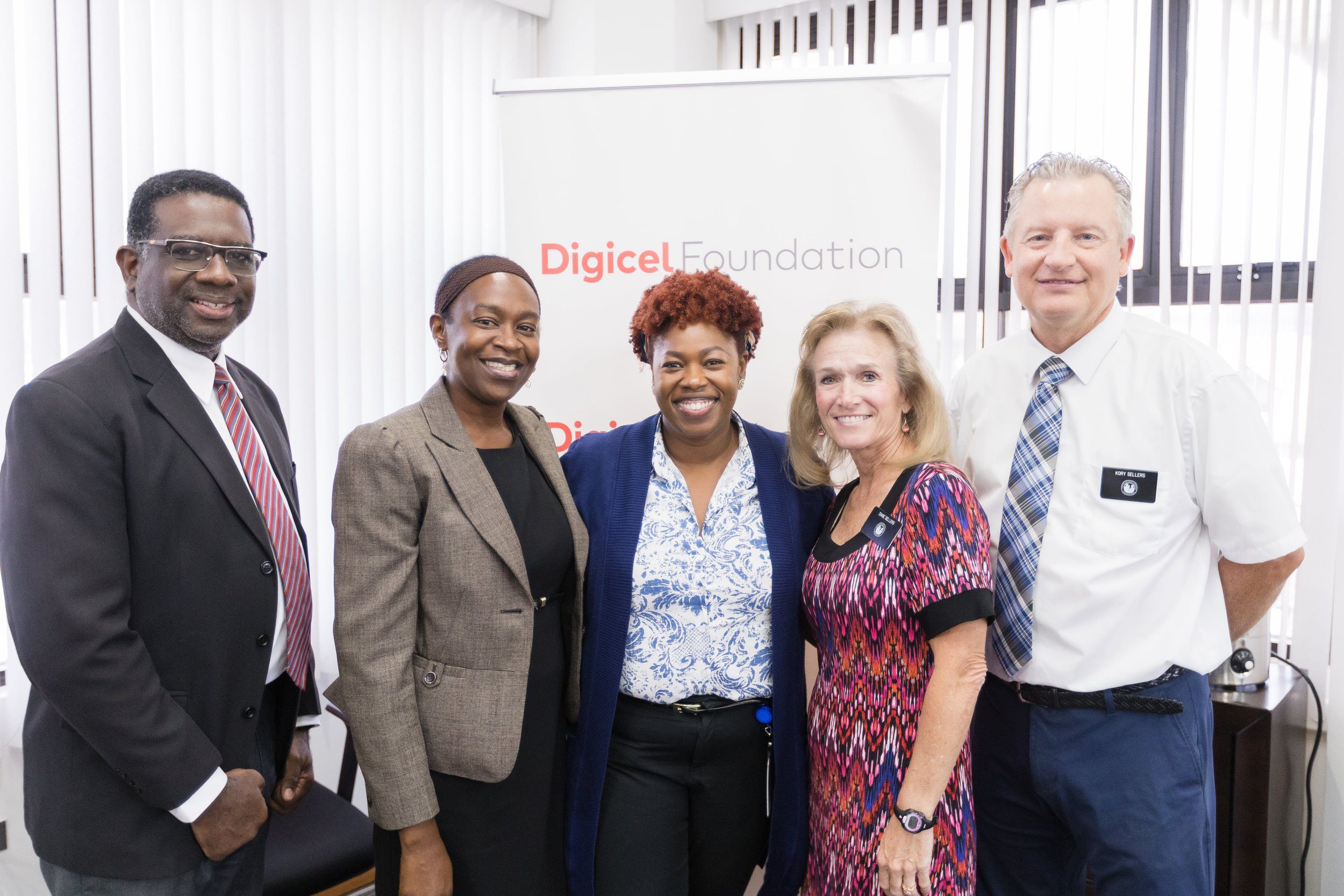  Representatives of the Digicel Foundation and The Church of Jesus Christ of Latter Day Saints finalise their partnership to support vulnerable women and youth at the Digicel Foundation’s Headquarters on Tuesday 5 December 2023. L-R: Bishop Emrol Gould, Alicia Cooper, Cindyann Currency, Diane Sellers and Kory Sellers. 