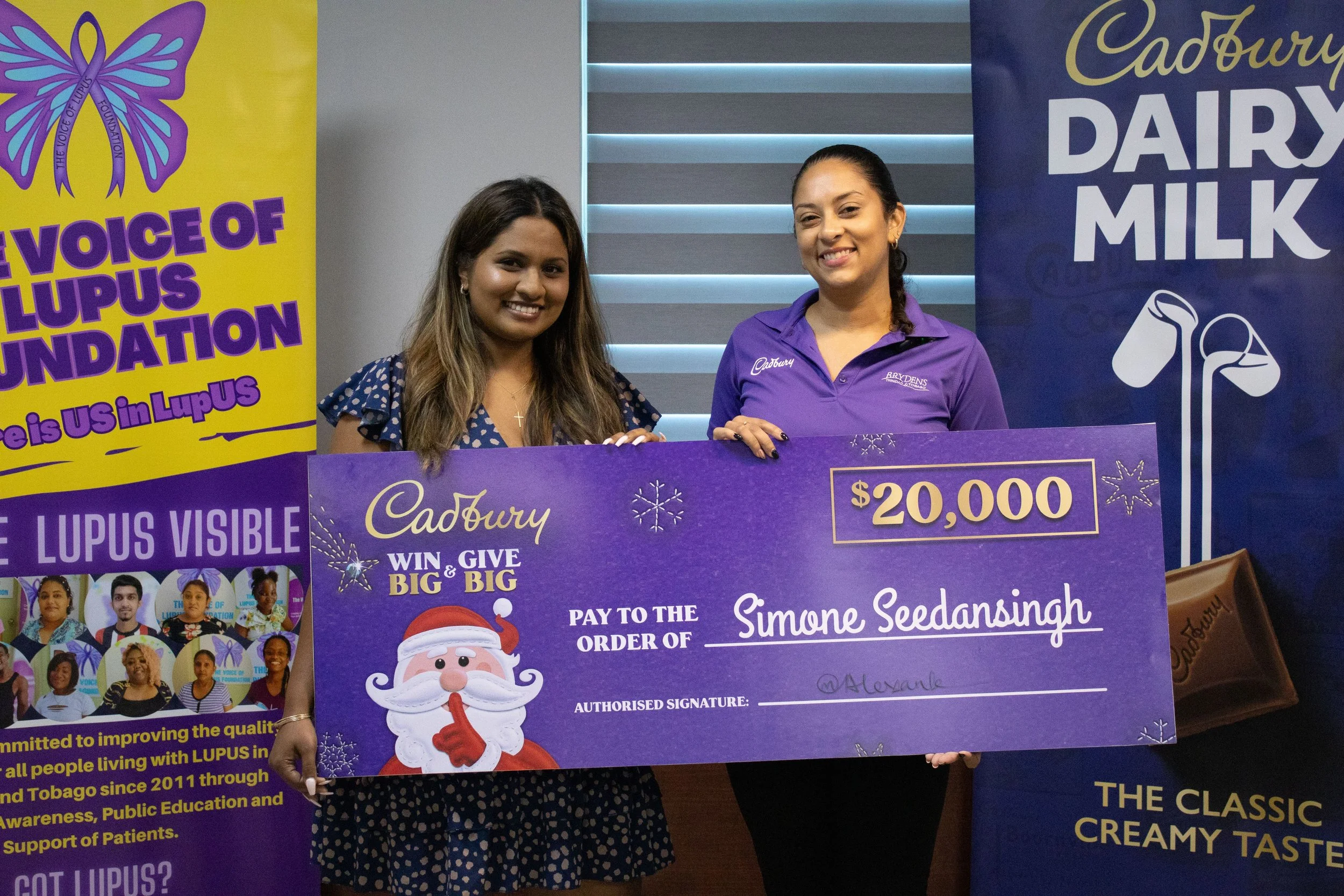 (L-R) Simone Seedansingh, Cadbury’s Promotion Winner, with Cherysse Alexander, AS Bryden & Sons Ltd, Group Product Manager for Food & Grocery Division.