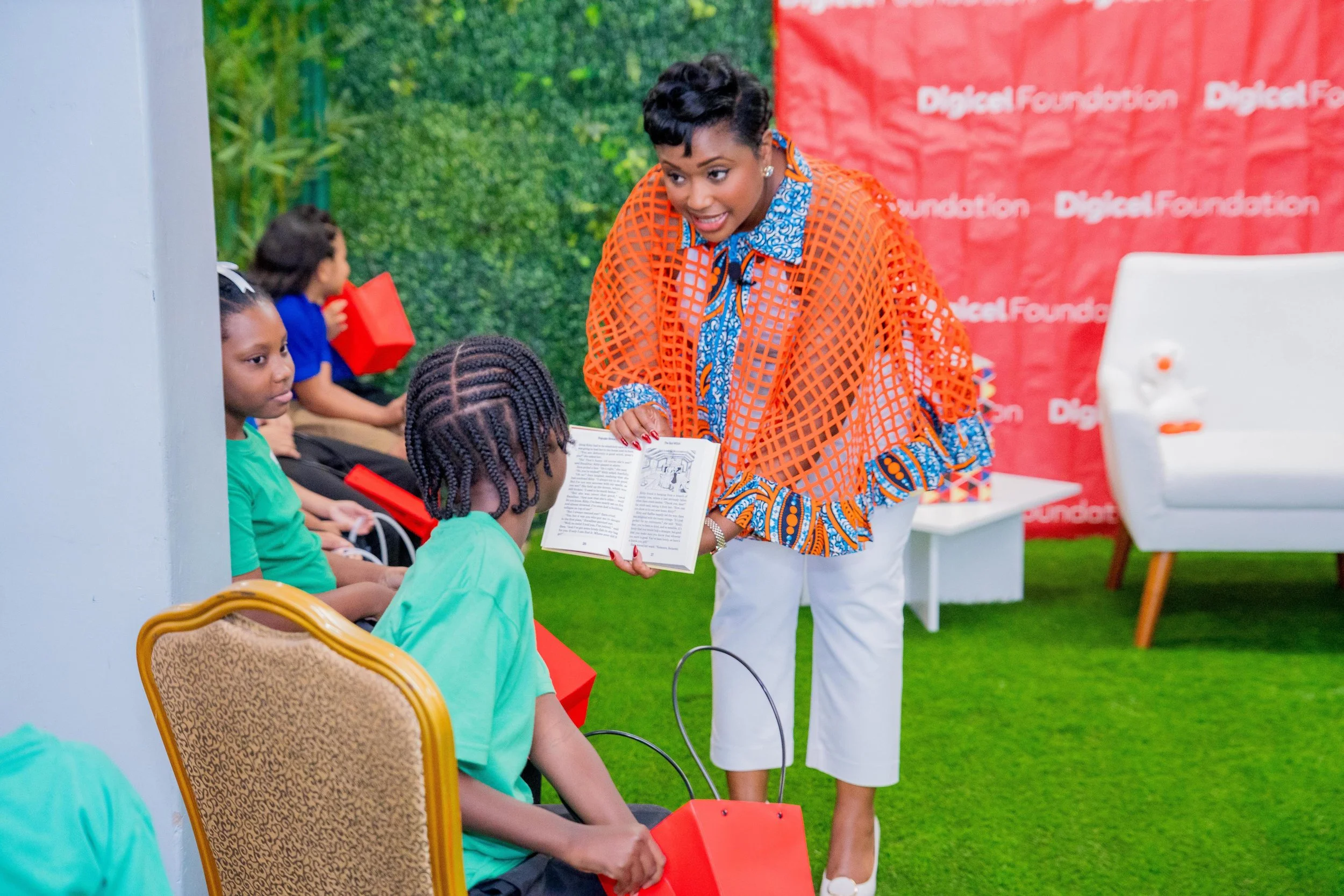 Deputy Mayor of Port-of-Spain Councillor Abena Hartley has the rapt attention of students during her storytelling session.