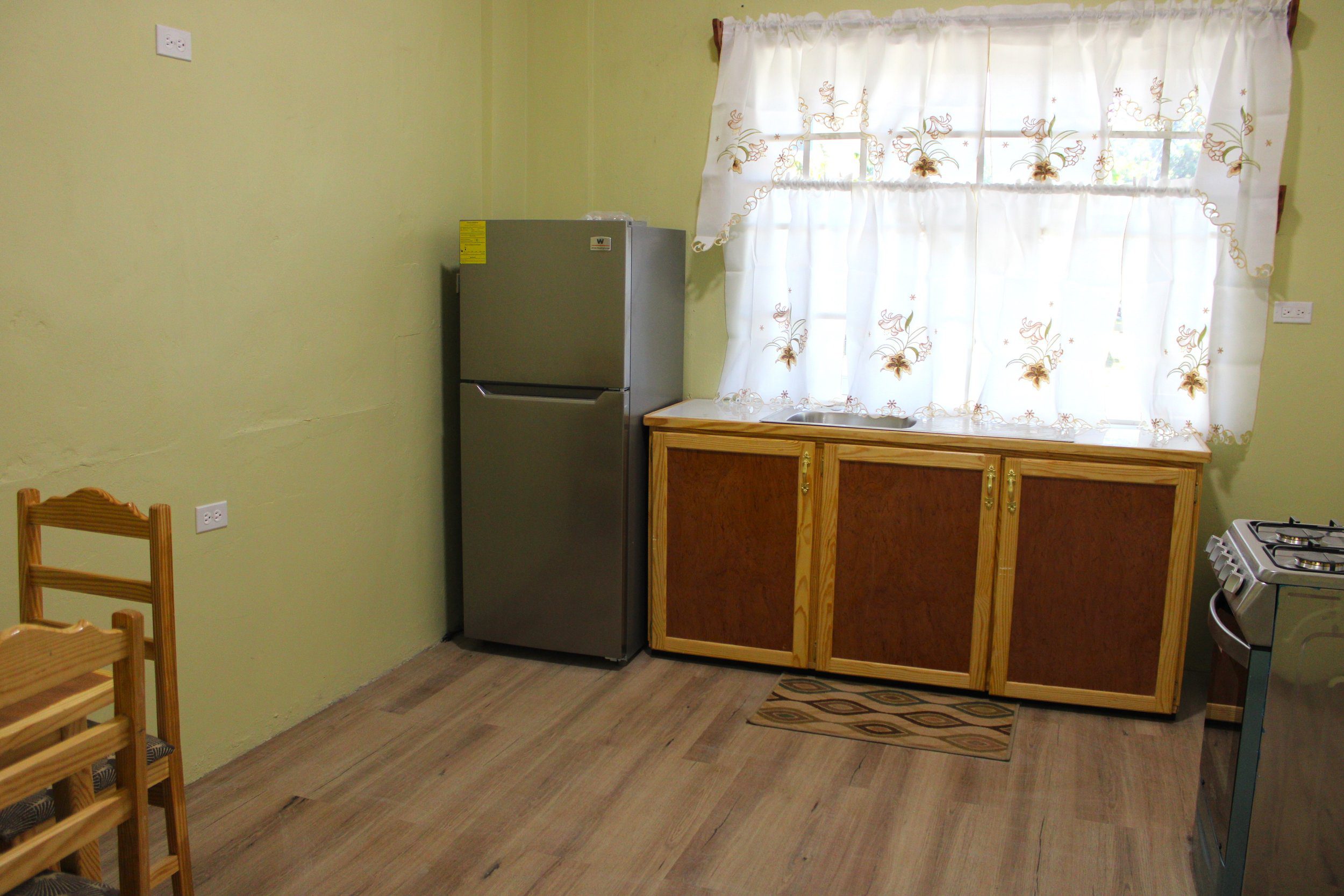 The kitchen at one of the new apartments at Tabitha’s Home for Women and Children in Tobago.
