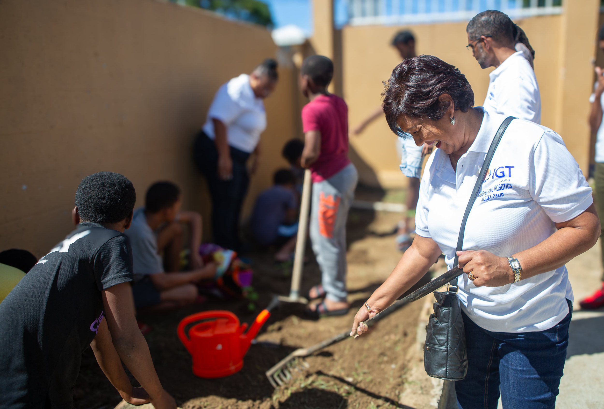 Shavindra Tewarie-Singh, IGT People & Transformation Regional Senior Manager for the Caribbean, and IGT staff volunteered to establish the kitchen garden at Rainbow Rescue Home for Boys.