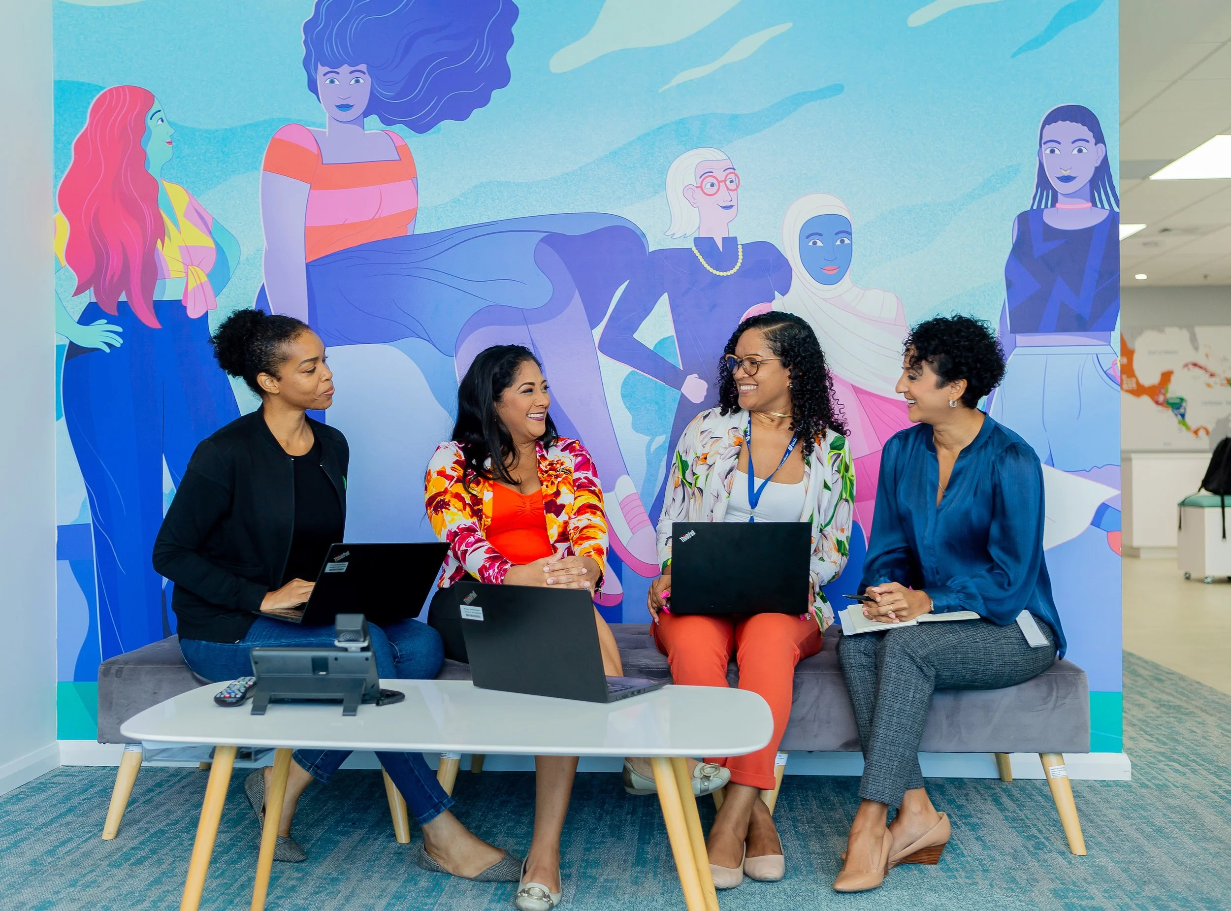 (L-R) Unilever Caribbean Ltd colleagues Leslee Lewis, International Logistics Coordinator Trinidad and Tobago; Jade de Vert, HR Country Lead; Deyna Mc Kell, Brand Coordinator (B&PC/Foods and Ice-Cream); and Ginelle Lambie, National Finance Manager, in the collaborative workspace at UCL’s headquarters in Port of Spain.