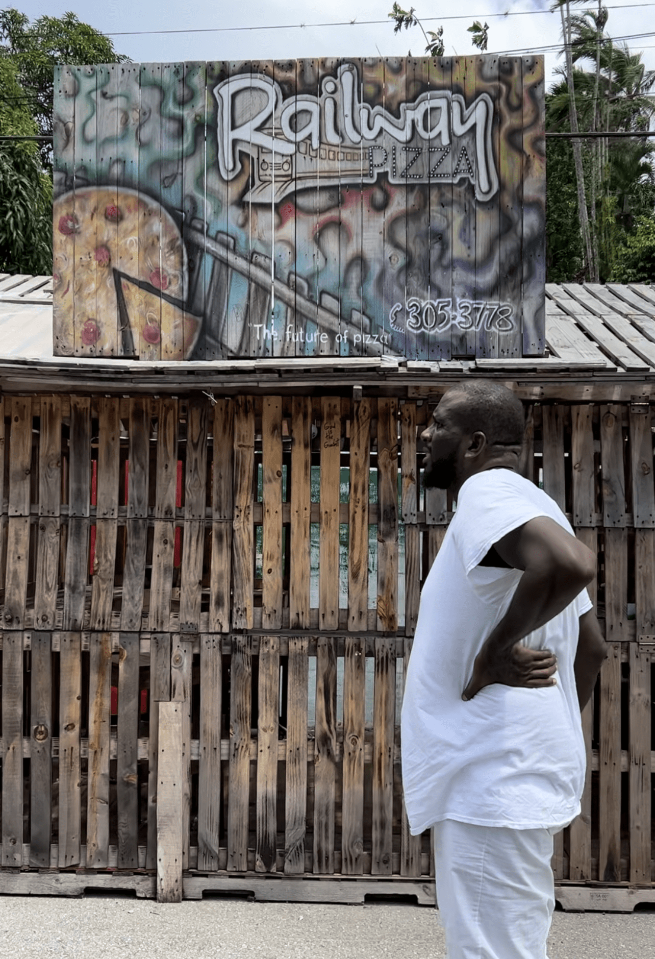 Akinola Sennon, Executive Director of the Deltones Institution of Music and Steel Drums, at the site of the organisation’s Railway Pizza initiative.