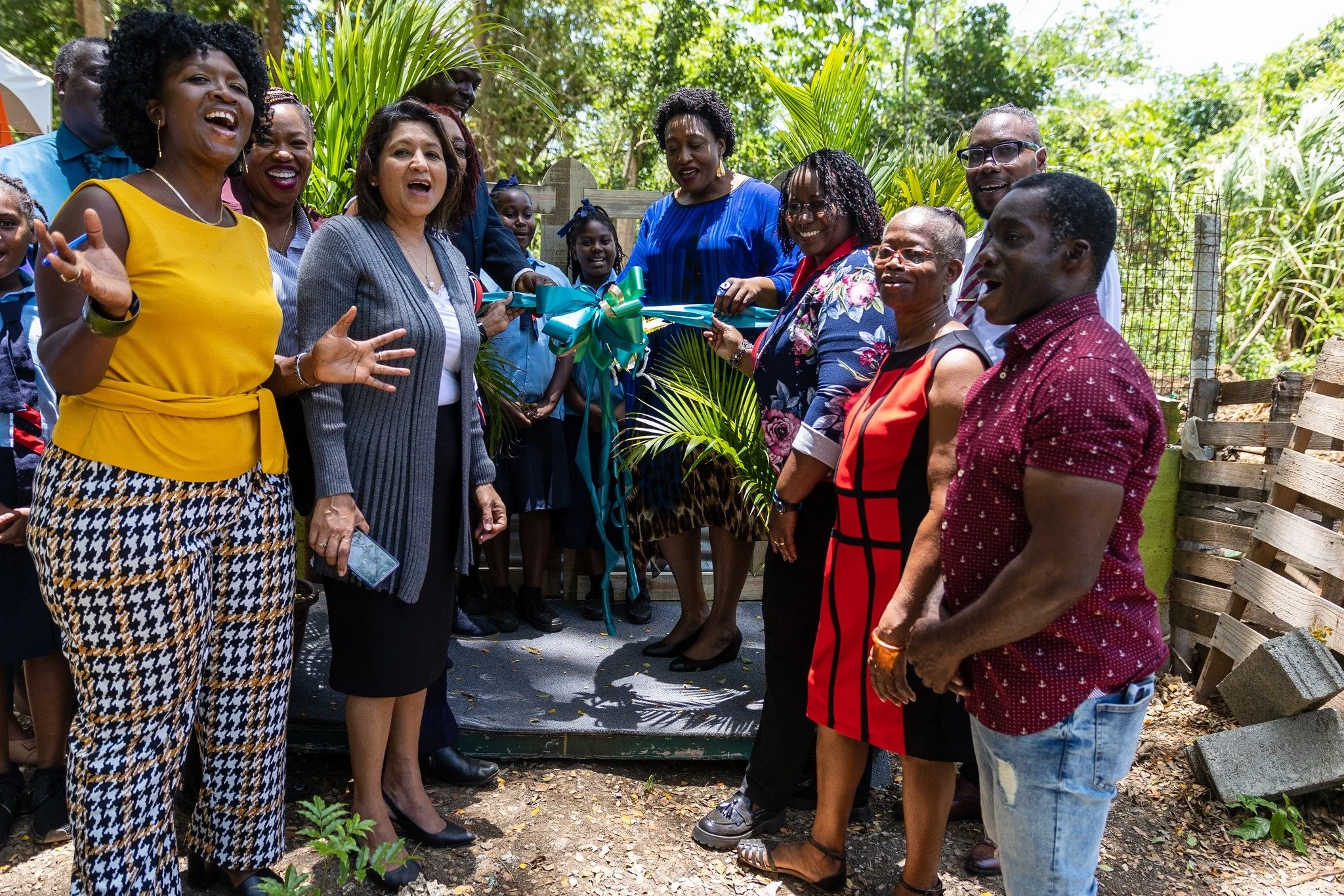 (Centre) Assemblyman Nathisha Charles Pantin, Secretary for Food Security, Natural Resources the Environment and Sustainable Development, cuts the ribbon to officiate the launch of Canaan Bon Accord Crab Farm at the Buccoo Historical Park on Orange Grove Road on April 12.