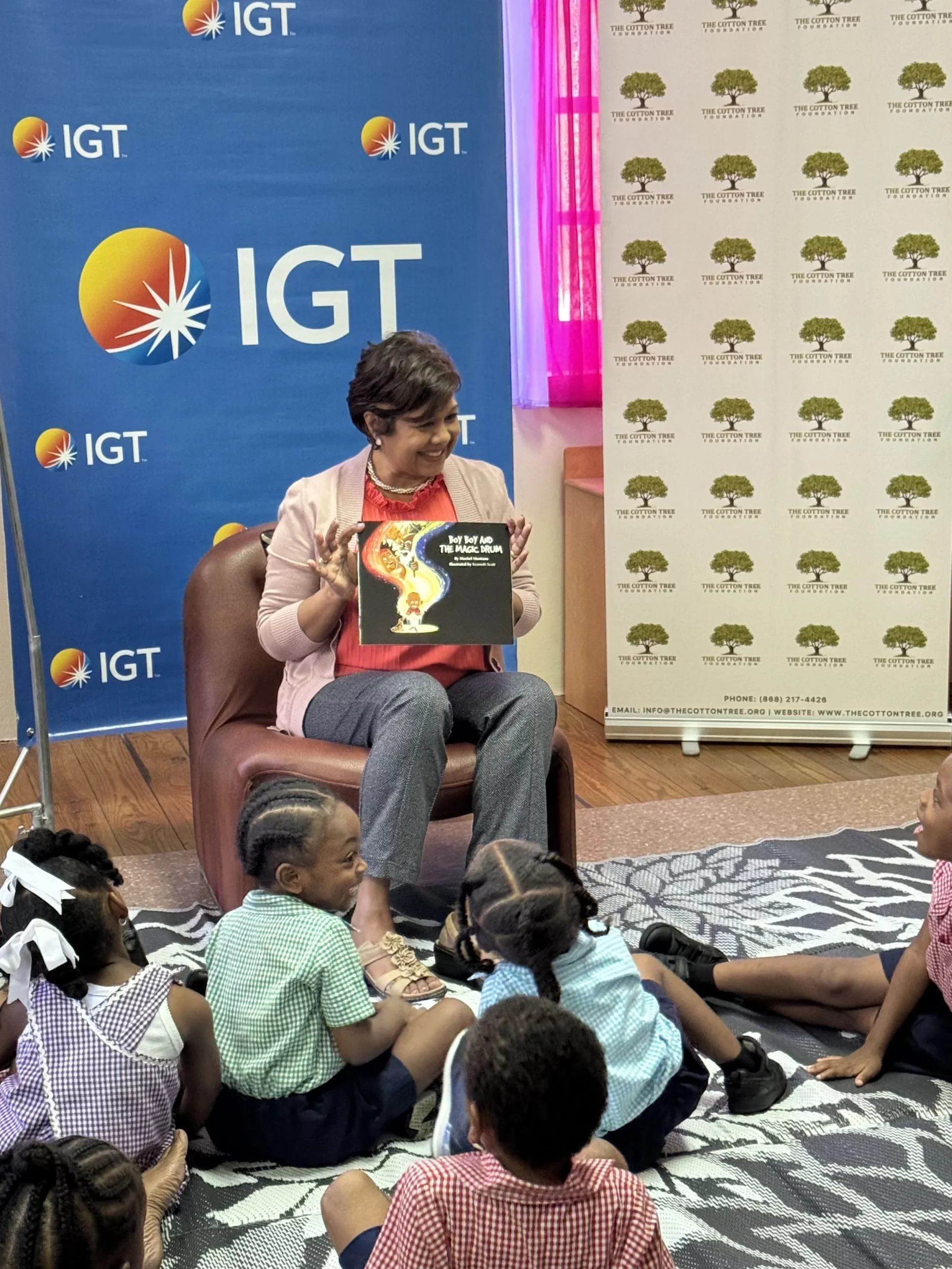  IGT P&T Regional Senior Manager for the Caribbean, Shavindra Tewarie-Singh, leads the Carnival storytelling at the Cotton Tree Foundation in St. Anns. 