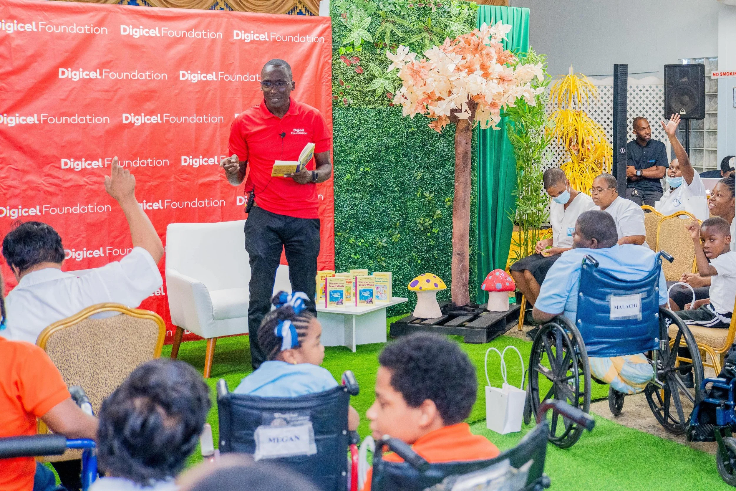 Students were eager to share their thoughts with Digicel Foundation Director Guy Small during his interactive storytelling session.