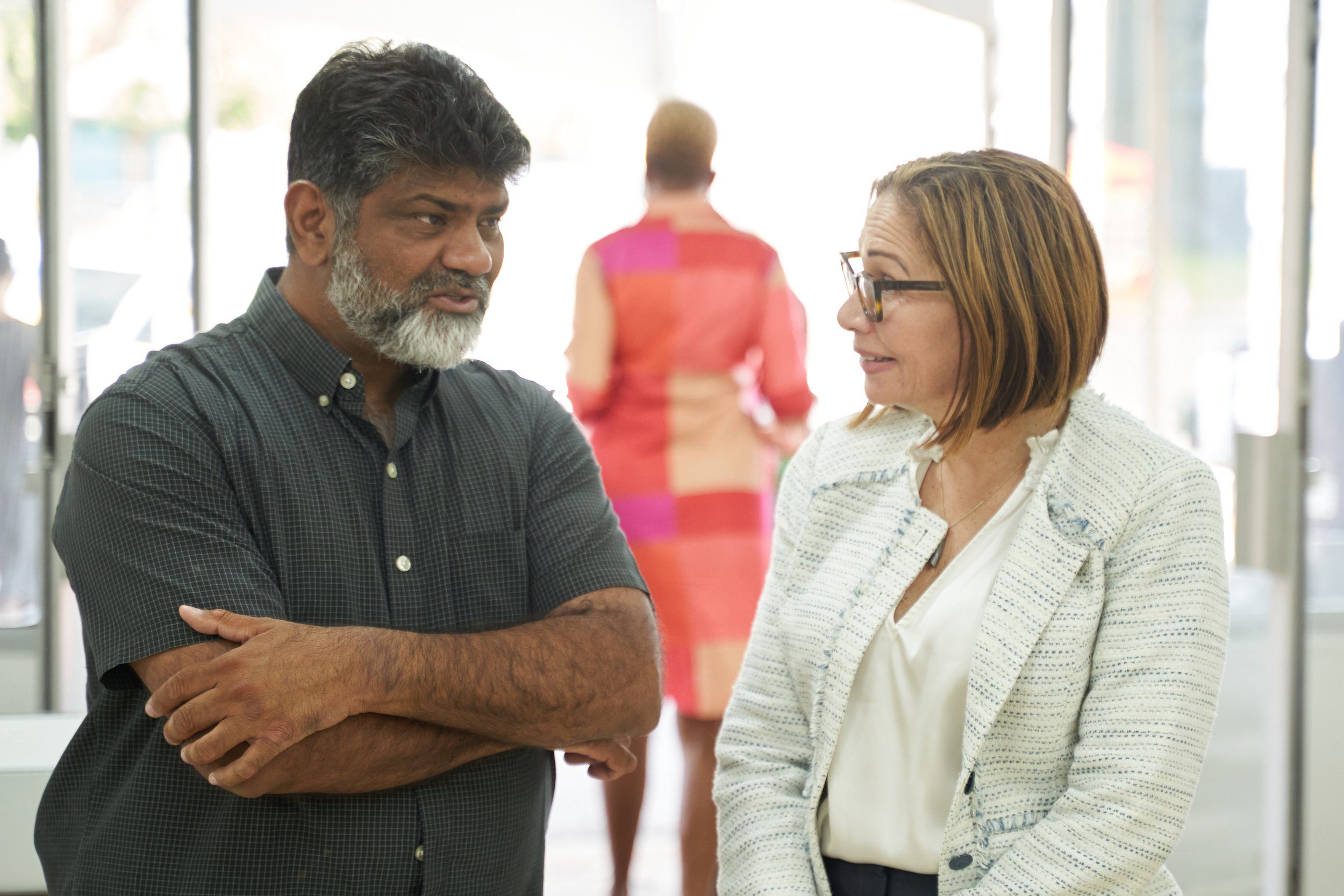  Director of Price Club Supermarket Shamshad Ali chats with CKFTO Vice-Chairman Sofia Figueroa-Leon at the CKFTO Chaguanas Clinic, Ramsaran Street, on 15 April. 