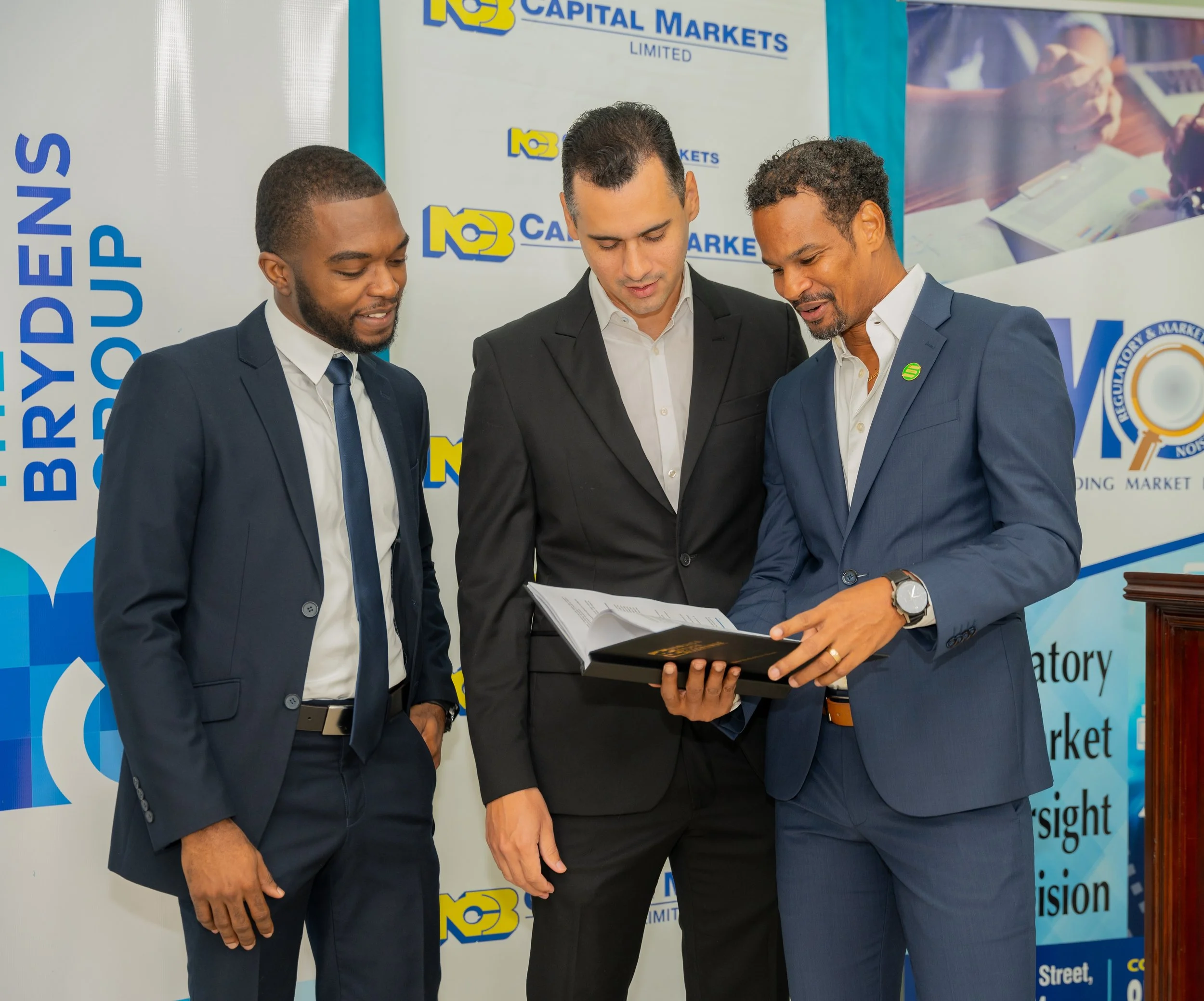 (Left to right) Alex Johnson, Manager, Origination and Structuring NCB Capital Markets; Alexander Marston, Group Finance Manager, Mussons; and Damion Dodd, Chief Financial Officer & Corporate Secretary, Seprod Group.