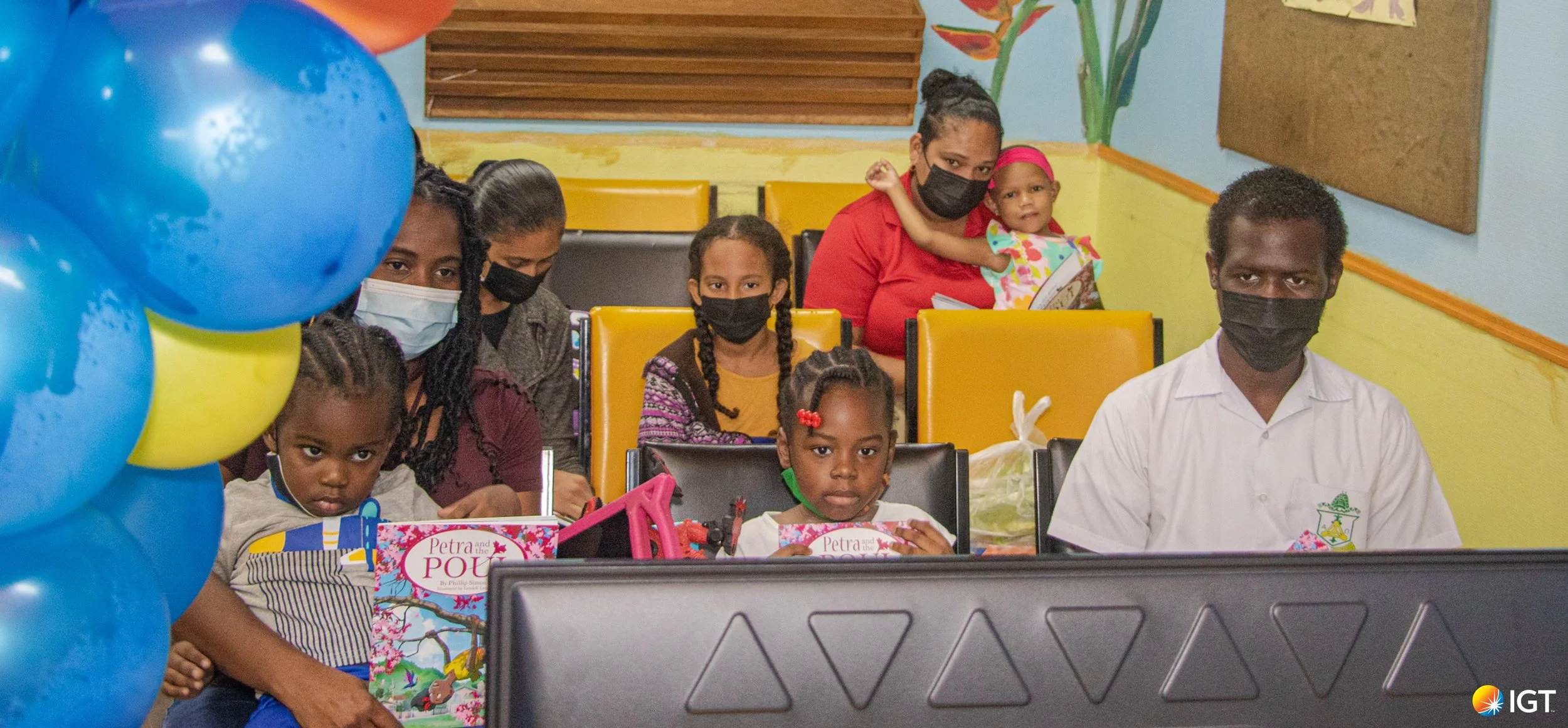 Patients of the pediatric oncology clinic and their families were fully engrossed in the virtual storytelling session while holding their personal copies of the local children’s book Petra and the Poui , signed by the author Phillip Simon and donated to them by the IGT ASA Programme.