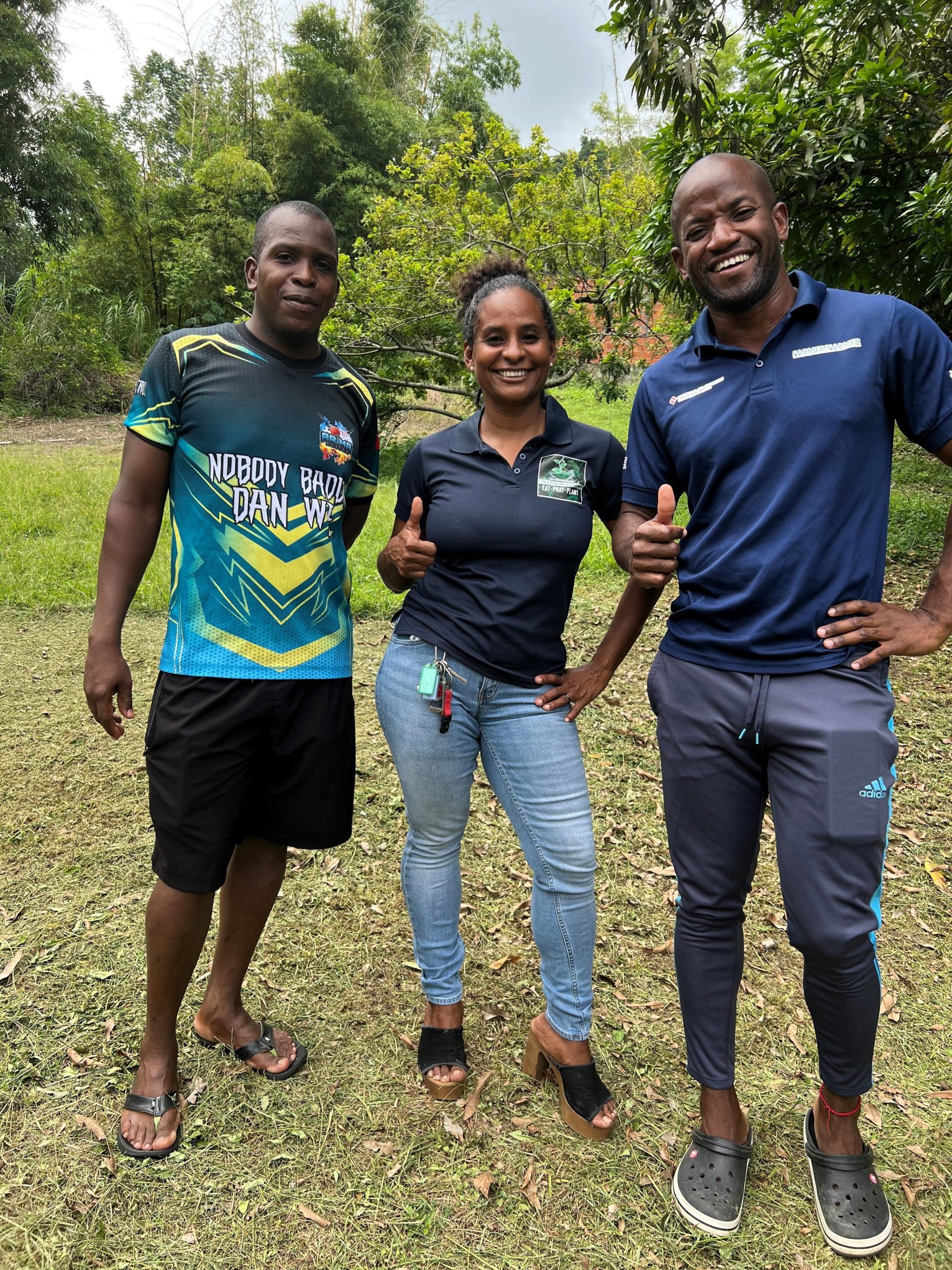 Members of the organisation One Seed for Change show off their winning smiles after receiving an EPIC grant for a unique agriculture project in the Heights of Guanapo and Aripo.