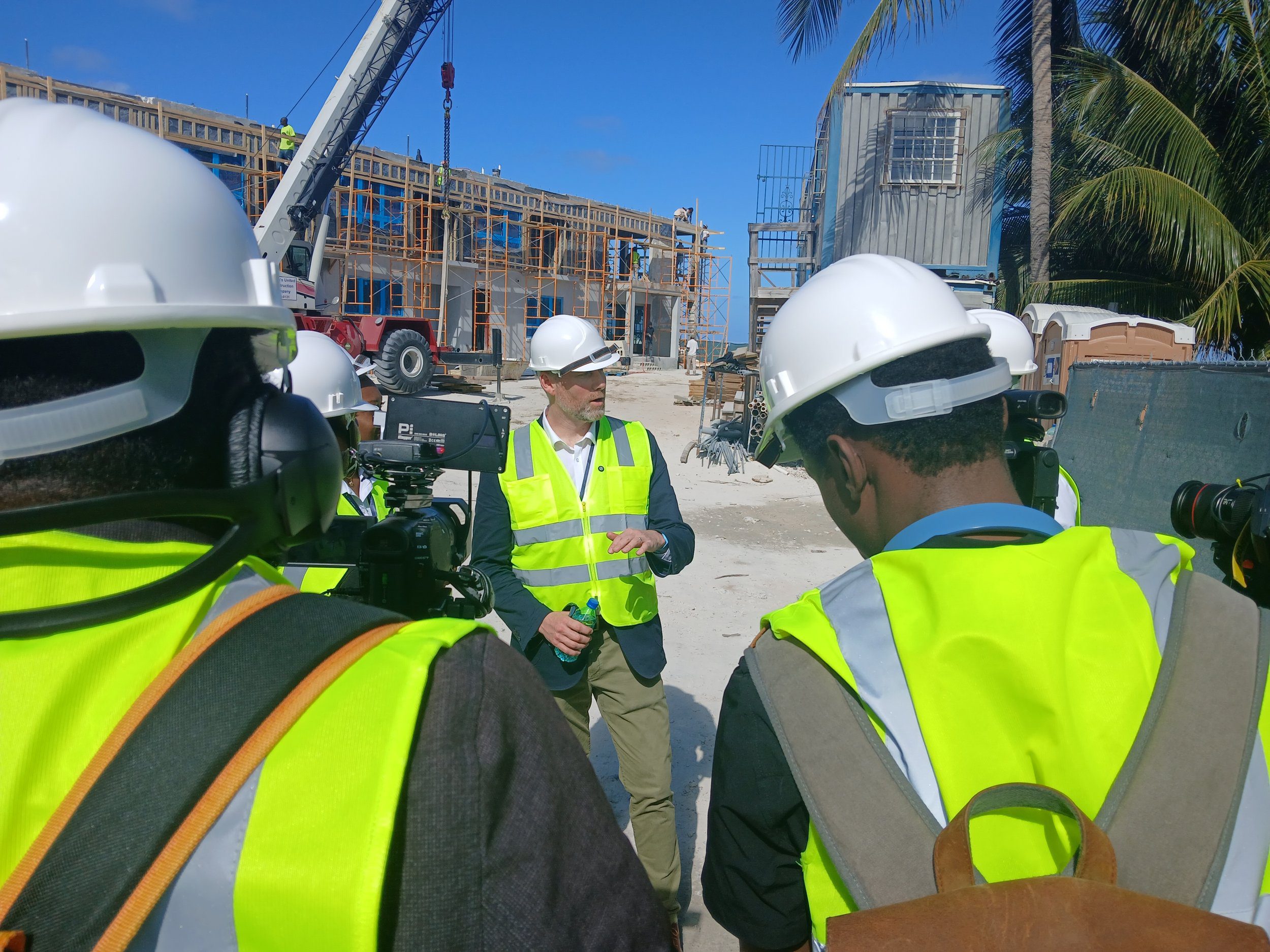 King’s College School Head of Boarding, Matthew Taylor, with media representatives at the King’s Beach Lodge site, Love Beach, on 31 January 2025.