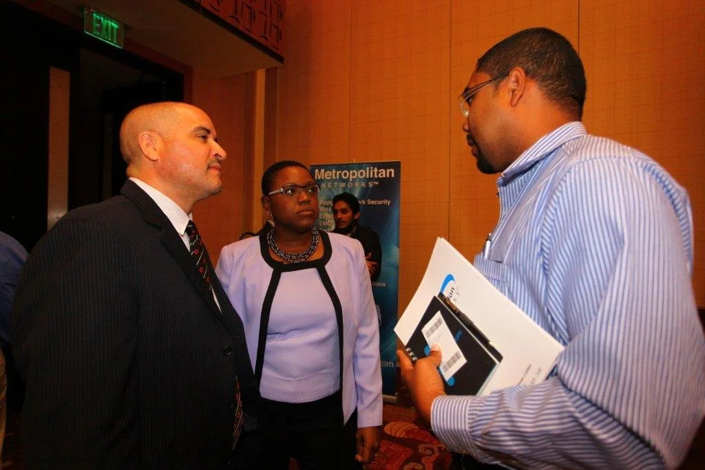 In deep discussion are (from left) Gilbert Perez, Fortinet’s Country Manager for the Caribbean, Karla Edwards, General Manager of Metropolitan Networks, Trinidad and Kern Monsegue from the University of Trinidad and Tobago, one of the participants at the meeting.
