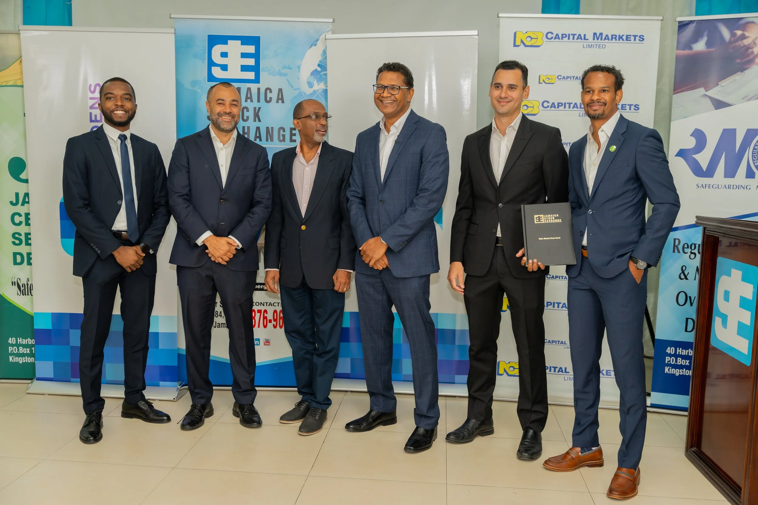 (Left to right) Alex Johnson, Manager, Origination and Structuring NCB Capital Markets; Nicholas Scott, Member of The Board, Seprod Group; Andre Gooden, Manager, Group Business Development, Jamaica Stock Exchange; Richard Pandohie, CEO, The Brydens Group; Alexander Marston, Group Project Manager, Mussons Group; Damion Dodd, Chief Financial Officer & Corporate Secretary, Seprod Group.