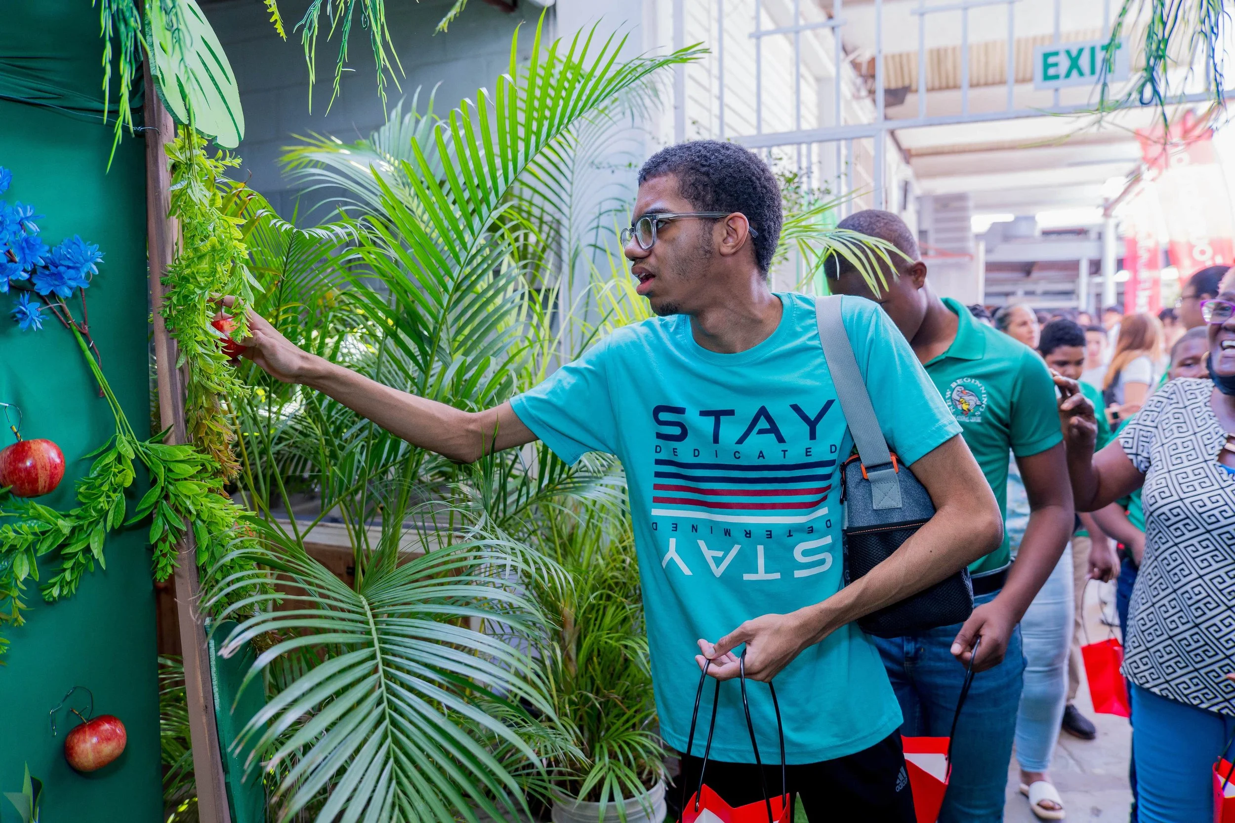 Students have fun picking fruits from the ‘enchanted garden’ as part of the day’s activities.