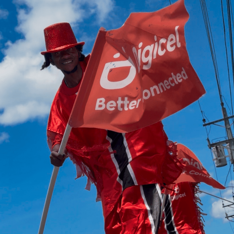 Taking connectivity to new heights! Moko Jumbies join the Digicel launch on High Street, Siparia.
