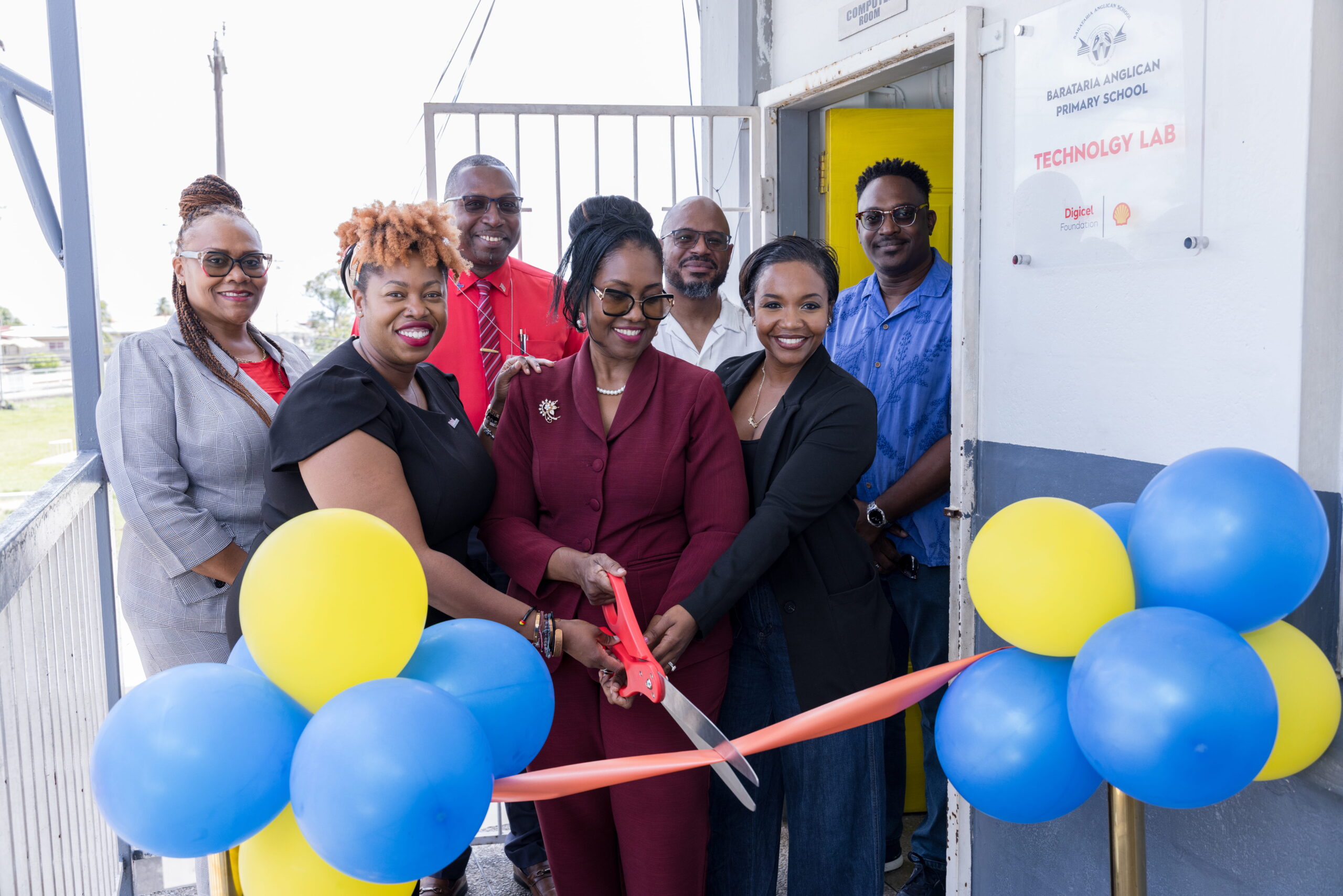 Photo 1: Officially opening the new technology lab at Barataria Anglican Primary School are, front row (left to right): Digicel Foundation Head of Operations Cindyann Currency, Principal Natalie Gillman-Gibbs, and Shell Trinidad and Tobago Social Performance and Social Investment Advisor, Ryssa Braithwaite. Back row (left to right): Acting Vice Principal Mrs Ramsay-Browne; School Supervisor II Chris Metivier; PTA President Kevin Liverpool; and Brendon Moore, Vice President of the PTA.