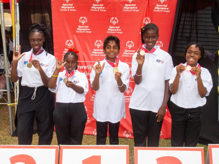 Young SOTT athletes display their medals with pride.